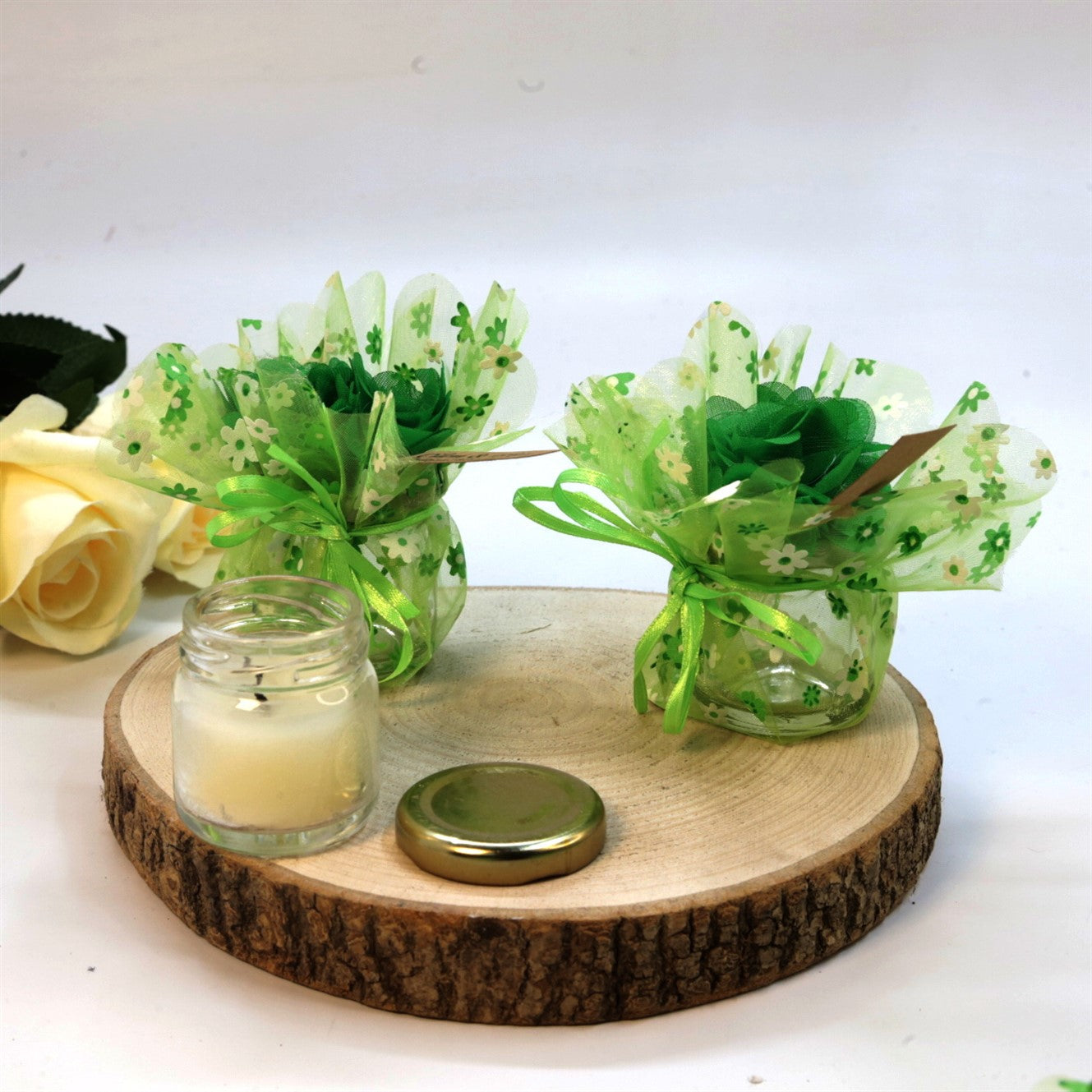 Kerze im Mini Glas mit grüner Organzasäckchen-Verpackung
