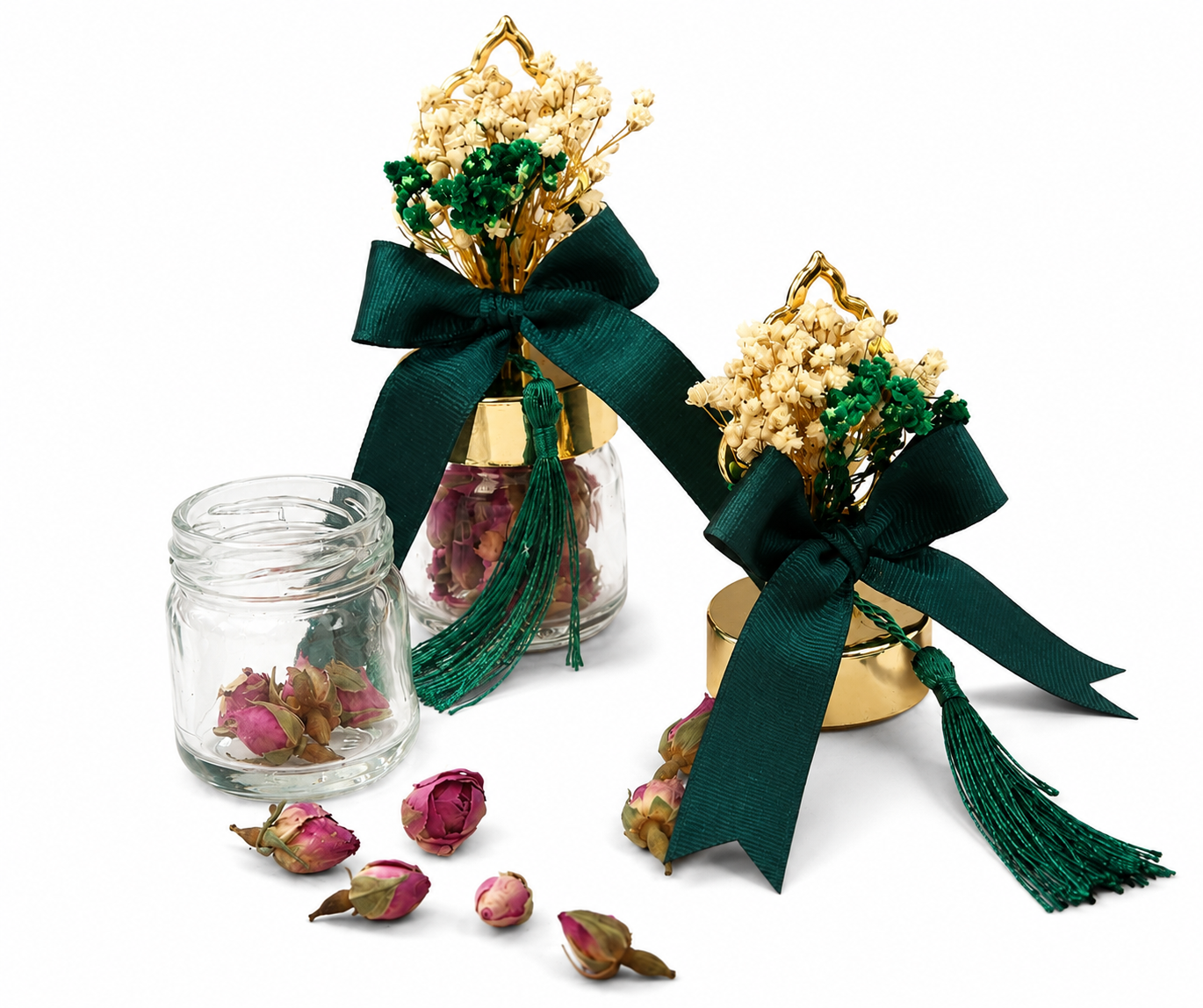 Personalisiertes Glasfläschchen mit getrockneten Rosenknospen, grüner Schleife und Trockenblumen