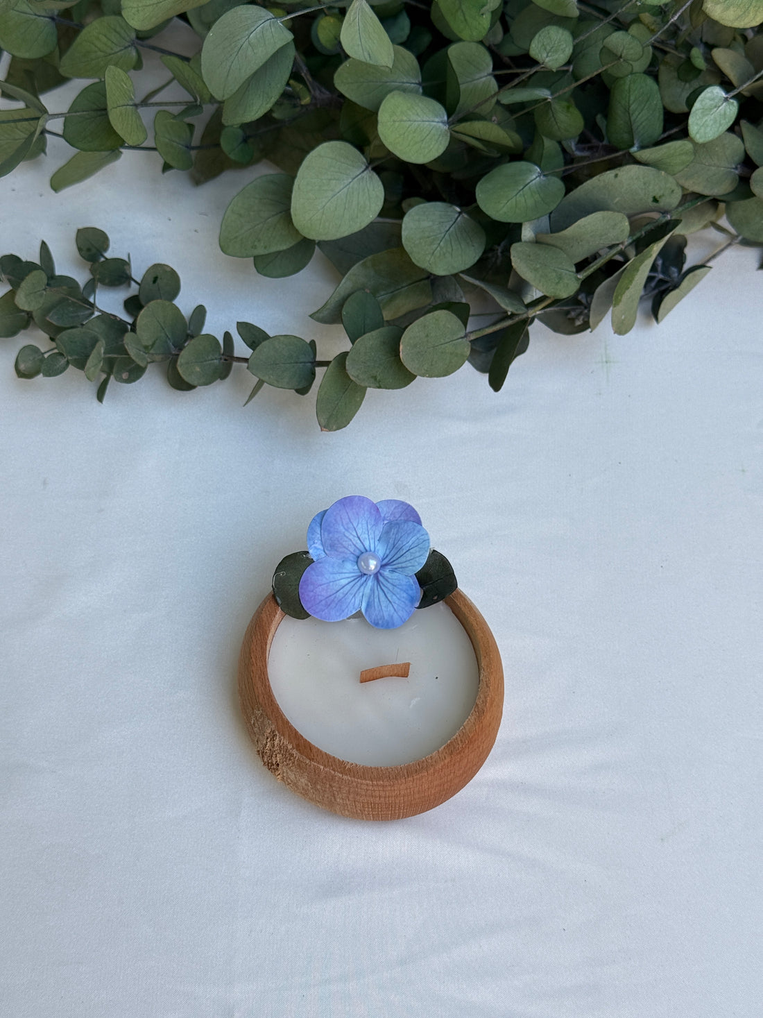 Kerze Holz mit Blüte