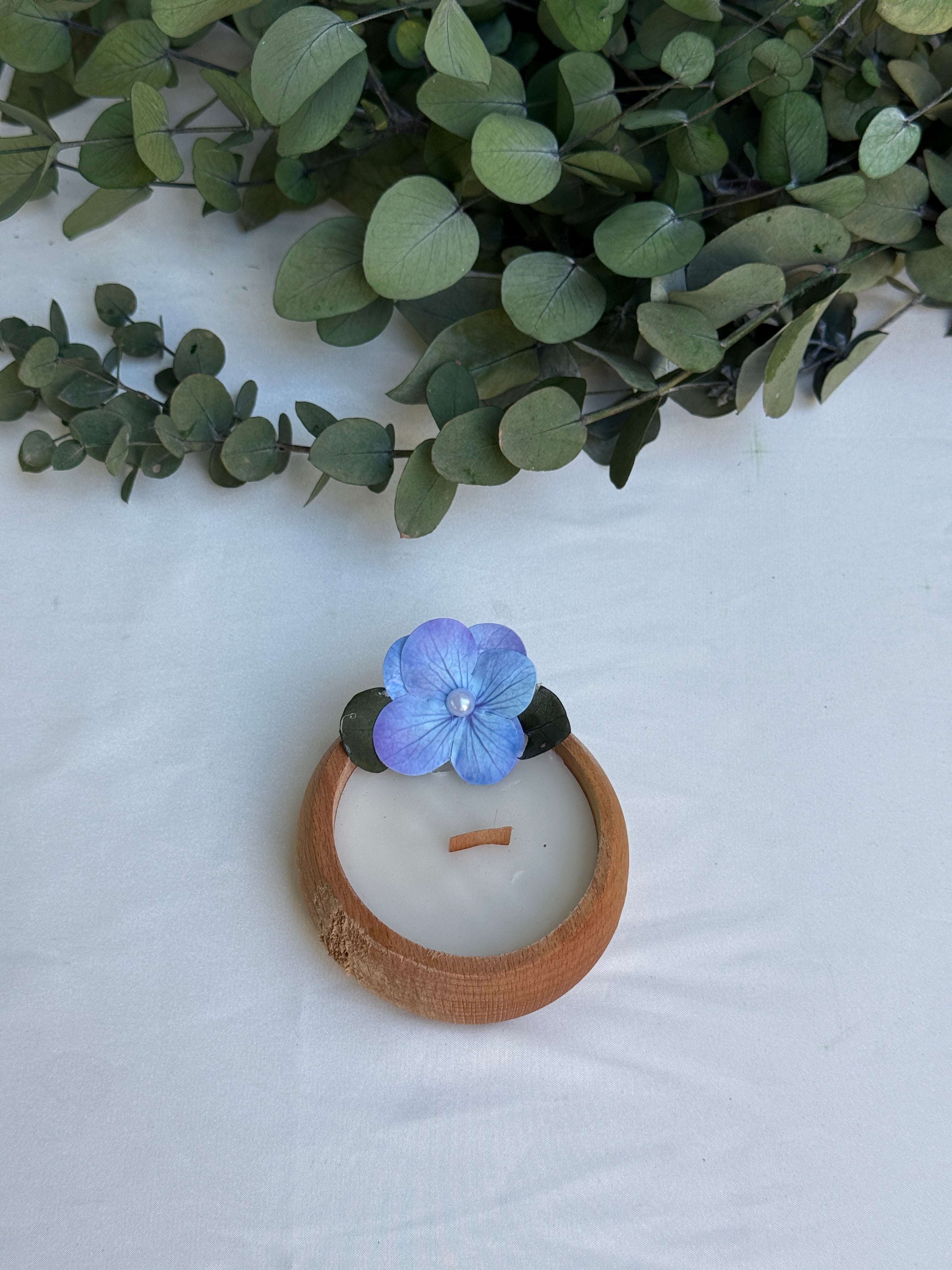 Kerze Holz mit Blüte