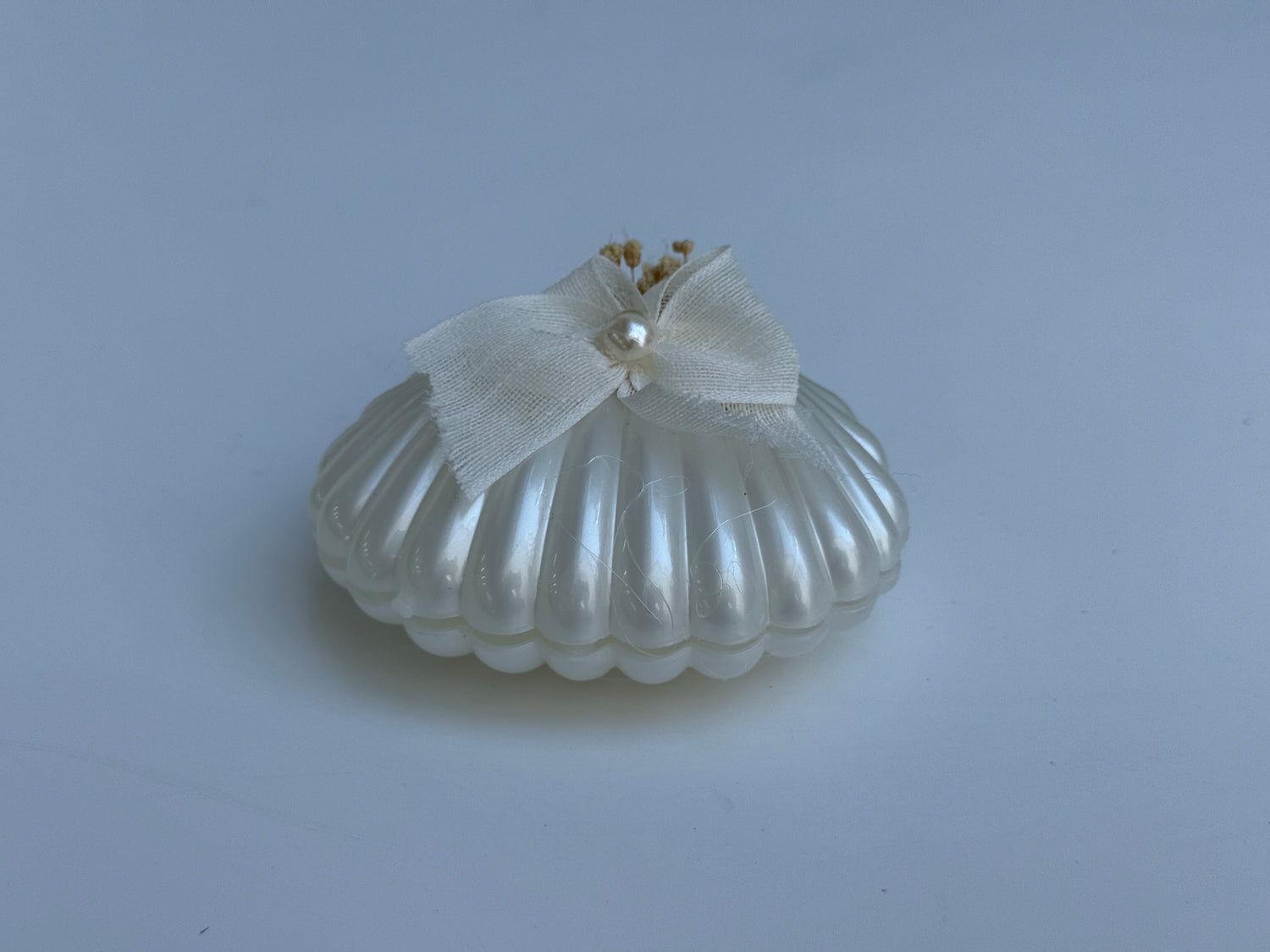 Muschelkerze mit Perle