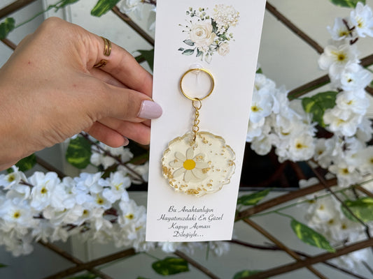 Gastgeschenk Set Epoxidharz‑Schlüsselanhänger Gänseblümchen (für 50 Gäste)
