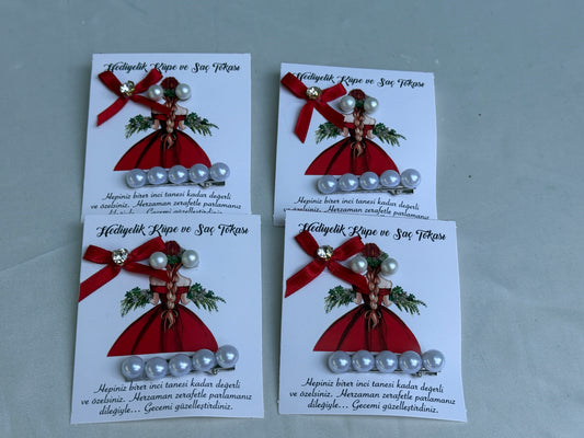 Gastgeschenk Set Perlen‑Haarklammer mit roter Schleife (für 50 Gäste)