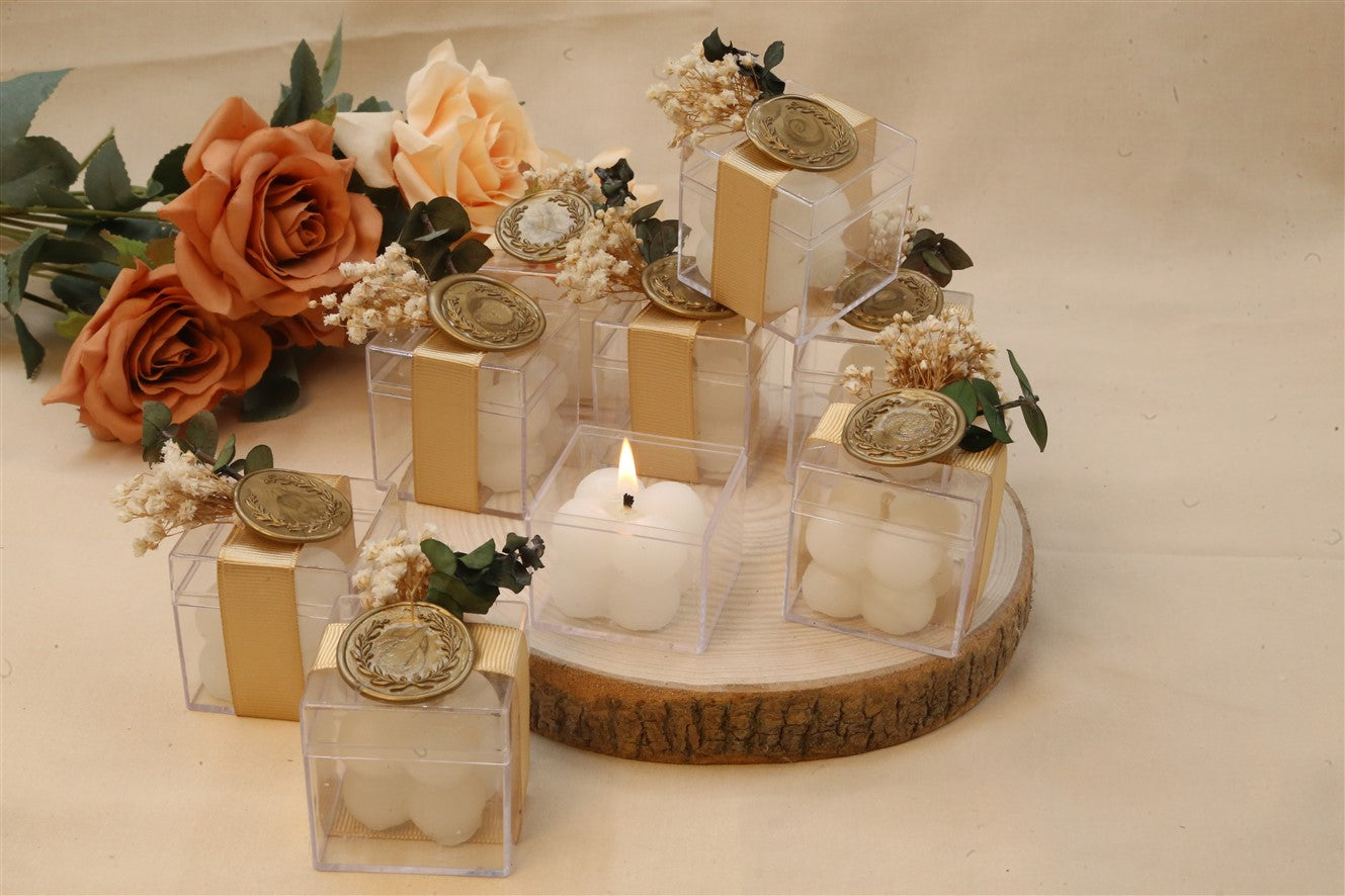 Bubble Kerze in transparenter Geschenkbox mit goldener Schleife und Siegeldeko